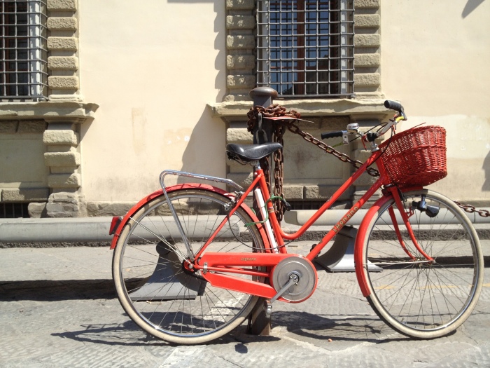 Red bicycle in Florence, Italy via MontgomeryFest